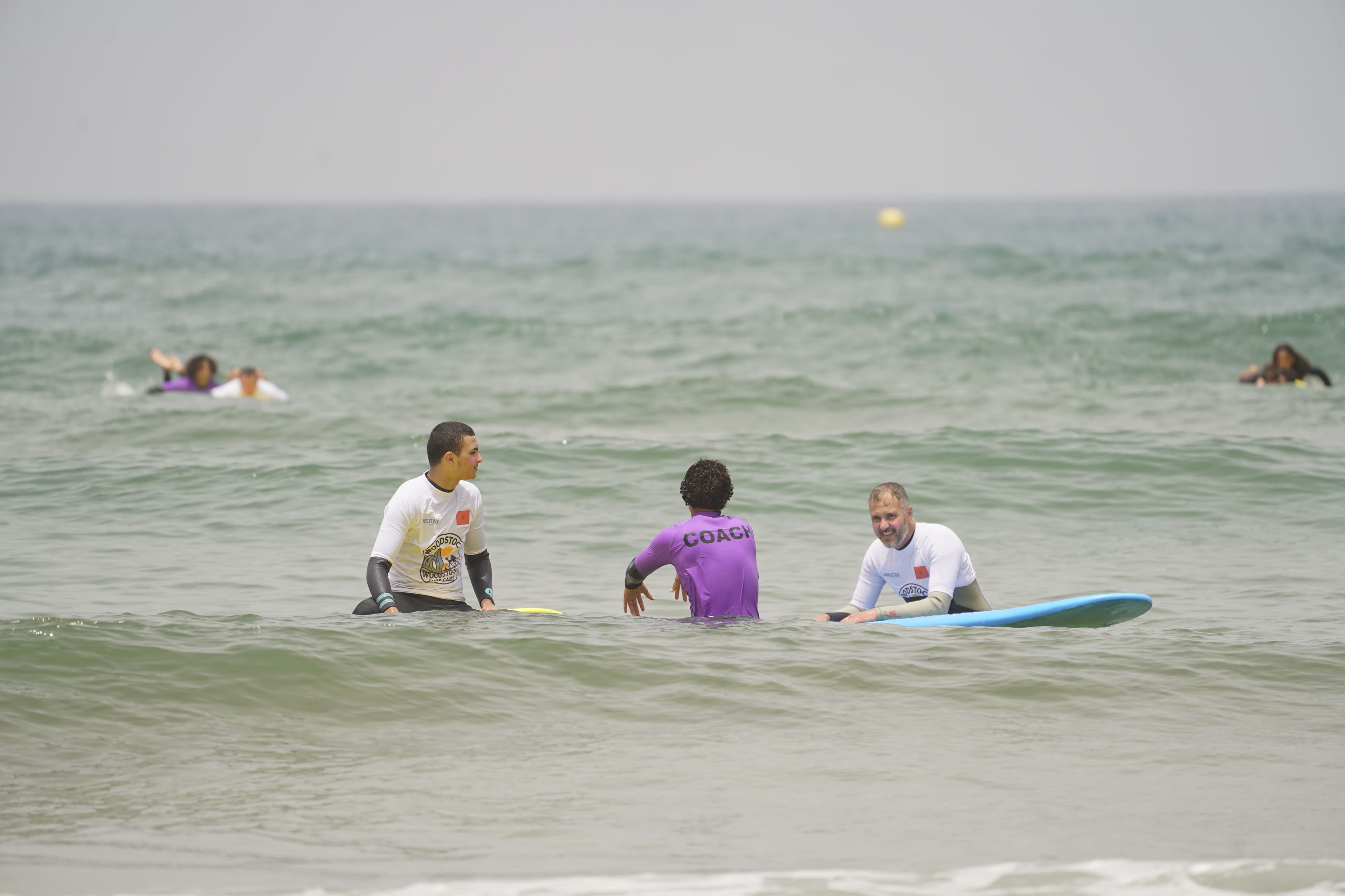 Woodstock surf group beginning a beach warm-up together